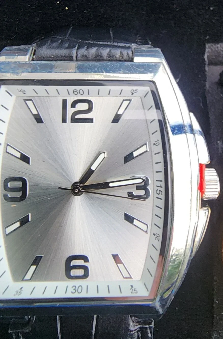 Silver Sunburst Dial Wristwatch